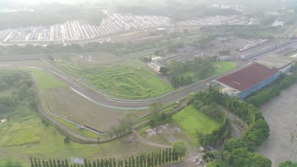 Footage Aerial View Sentul Circuit Morning Foggy Sun Rays Slightly — Stockvideo
