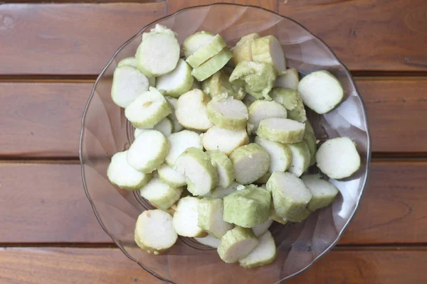 stock image a close up of lontong. Traditional food from Indonesia originating from rice filled with vegetables or meat and wrapped in banana leaves. Indonesian traditional food photo concept.