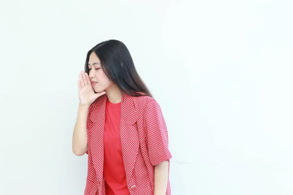 Portrait Beautiful Asian Woman Wearing Red Outfit Whispering Gesture Isolated — Stock Photo, Image