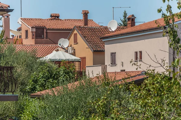 Roofs of houses in the private sector in the suburbs of Rovinj - Cocaletto in Croatia.