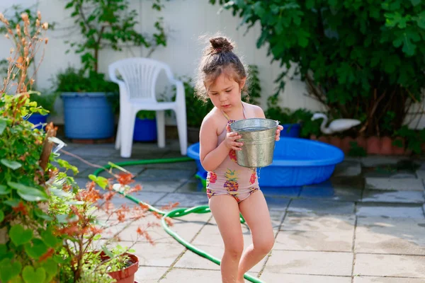 Cute Young Girl Watering Plants Bucket Summer Day Backyard — Stock Photo, Image