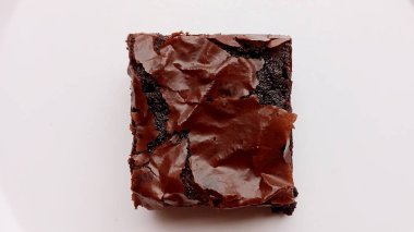 Çikolatalı brownie, kakao, erimiş çikolata, tereyağı, şeker, yumurta ve unla yapılan zengin, yoğun ve şekerli bir tatlı. Çoğunlukla fındık, krema ya da çikolata parçacıklarıyla süslenirdi..