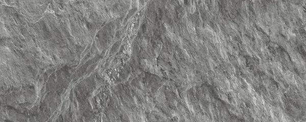 Karanlık taş veya kayrak duvar. Grunge arka plan