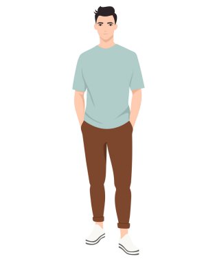 Mavi tişörtlü, kahverengi pantolonlu sıradan bir genç adam şık ve sade görünüyor..