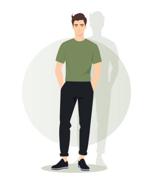 Açık yeşil tişörtlü ve siyah pantolonlu genç bir adam. Renk stile tazelik ve doğallık ekler.