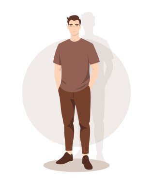 Açık renkli tişört ve kahverengi pantolon giyen genç bir adam. Rahat ve sade ama şık bir görünüm sergiliyor..