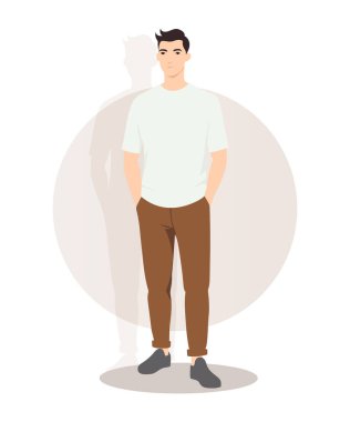 Temiz ve modern tarzda, düz beyaz tişört ve kahverengi pantolon giyen genç bir adam. Onun minimalist görünümü moda tasarımları, reklamcılık ve çağdaş erkek giyim eğilimleri için idealdir..