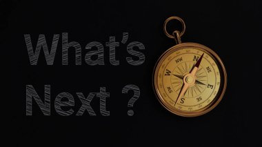 Written What's Next words and gold compass on black background.3D illustration. clipart