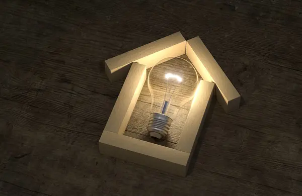 house shape made by wooden block with light bulb inside. energy saving concept. estate business conceptual.