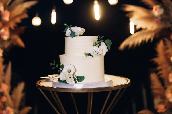 Elegant wedding cake during reception. High quality photo