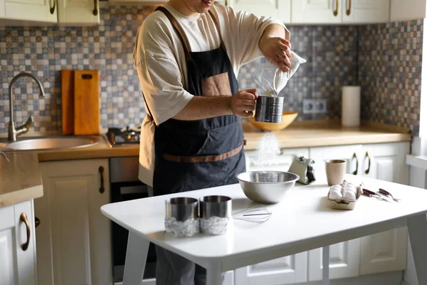 stock image pastry chef preparing a cake, bento cake, decorating a cake, step by step process of making a cake, sifting flour. High quality photo