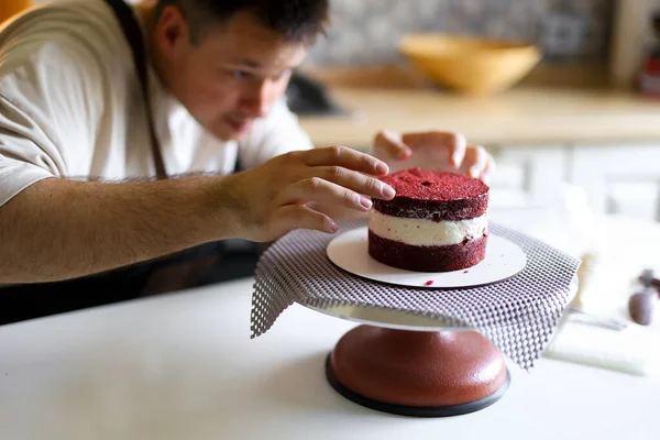 confectioner prepares a cake, bento cake, decorates a cake, the process of making a cake step by step. High quality photo