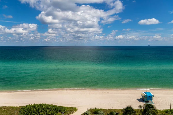 stock image Beach view with a horizon, a blue sky, a big sea and a beautiful vacation landscape, waves