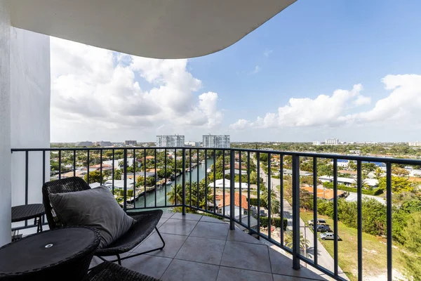 Beautiful view from the balcony towards the bay of Miami, bridge with trees, horizon, blue sky, tropical vegetation