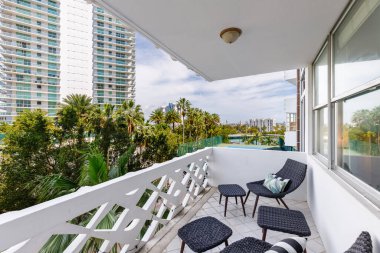 Contemporary Balchony building in bustling cityscape, located in Florida, USA. Showcasing modern architectural design and development.