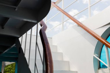 Railing and stairs of yacht and sky at background at daytime  clipart