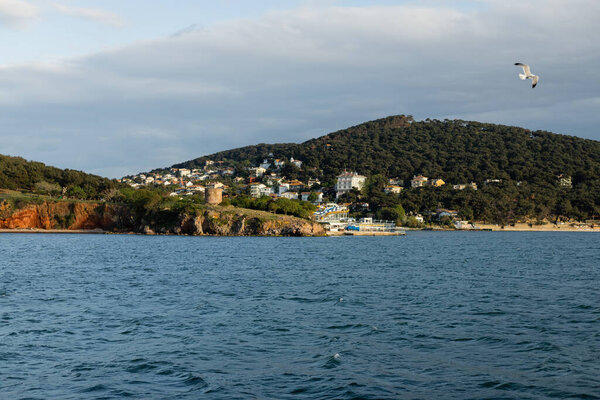 blue sea near coastline and houses on Princess islands in Turkey 