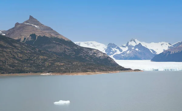 Landscape of Lake Argentino with glaciers, mountains, snow and ice.