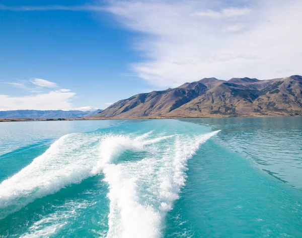 Landscape of Lake Argentino and mountains in the background.