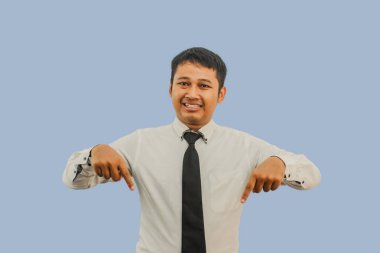 A man  smiling happy with both hands pointing down clipart