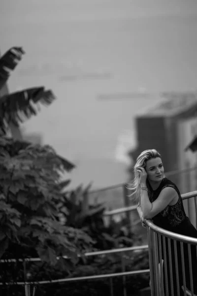 Beautiful Caucasian Blonde Girl Luxurious Black Dress Standing Backdrop Park — Stock Photo, Image