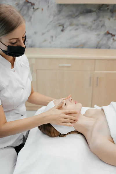 Shot Cosmetologist Making Face Massage Rejuvenation Woman While Lying Stretcher — Stock Photo, Image