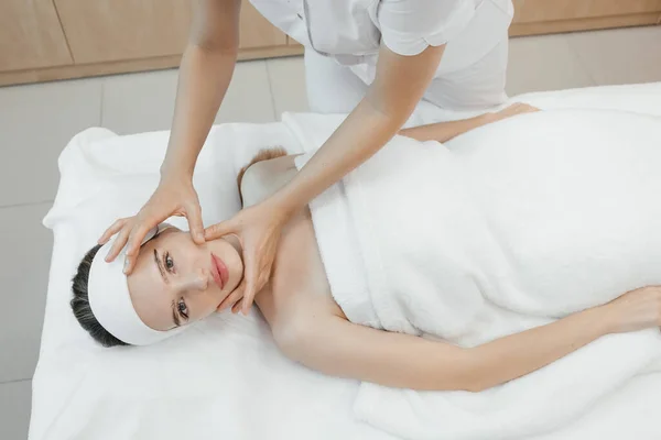 Shot Cosmetologist Making Face Massage Rejuvenation Woman While Lying Stretcher — Stock Photo, Image