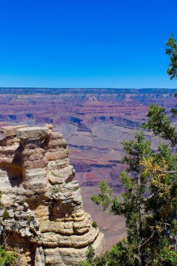 View of a rock formation and the Grand Canyon, Arizona. clipart