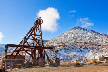 Audrey Headframe with snow on the ground in Jerome, Arizona. clipart