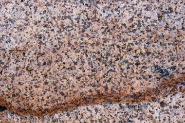 Doğal renk ve kalıplara sahip sert taş yüzeyine yakın çekim.