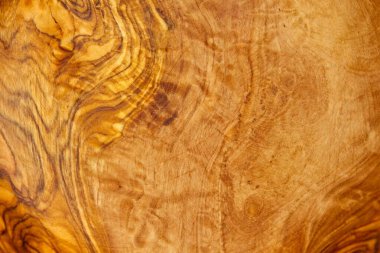 Açık kahverengi ahşap üzerinde ahşap tahıl yakın çekim.