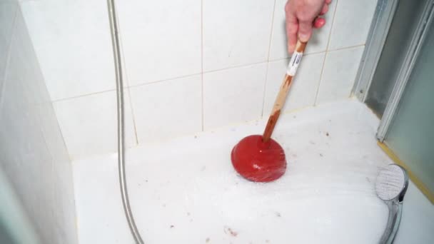 Person Cleans Shower Drain Clogged Sink Plunger Pipes Clogged Waste — Vídeos de Stock