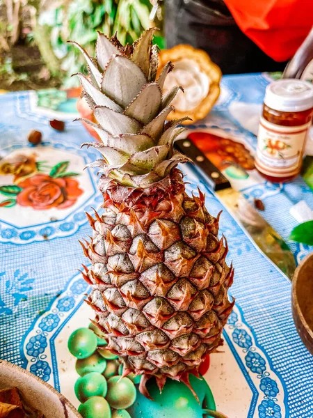 fresh pineapple and fruits on the market