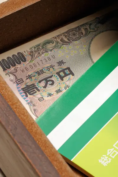 stock image Japanese money and bankbook in a drawer