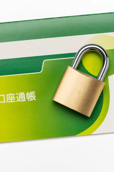 stock image Japanese bankbook and padlock