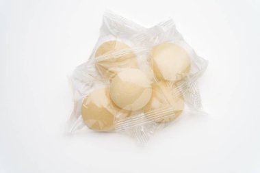 Individually wrapped Japanese rice cakes 'mochi' clipart