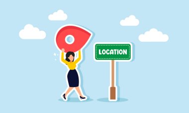 İş, kişisel ya da proje amaçlı bir konum belirlemek. Bir iş kadını belirli bir bölgeyi işaretlemek için lokasyon rozeti tutuyor.