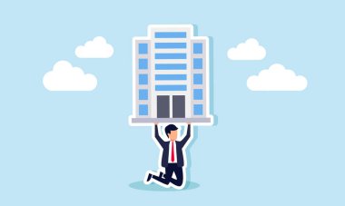 Bir işadamı, bir şirket binasını kaldırmaya çalışıyor. Bir şirketin ticari varlığını sürdürmesinin ağır yükünü taşımanın göstergesi.