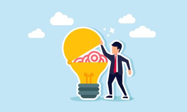 Bir işadamı, çeşitli hedef tahtaları içeren bir lamba açar, iş hedeflerine ulaşmada performansı artırmak için fikirlerin ve yeniliklerin resmedilmesi