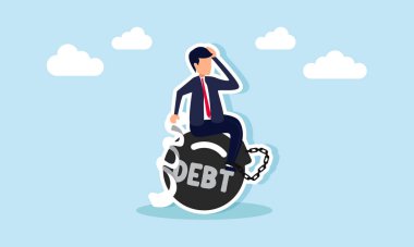 İşadamı bir fatura tutuyor ve DEBT etiketli demir bir ağırlığa zincirlenmiş durumda. Borç ve daha sonraki ödeme yükümlülüklerinin ağırlığı altında sıkıştığının bir göstergesi.