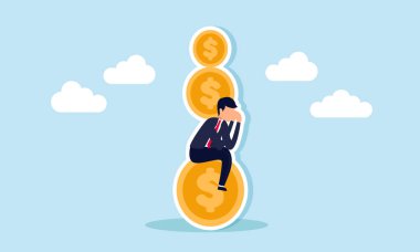 Bir işadamı bir dolar sikkenin üzerinde otururken üzgün hisseder. Vücuduna para yığını bastırır. Borç yükünü şirket sorumluluğu olarak gösterir.