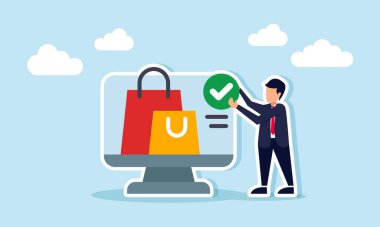 Bir işadamının elinde işaretli bir levha var. Monitörün yanında duruyor. Bir alışveriş çantası sergiliyor.