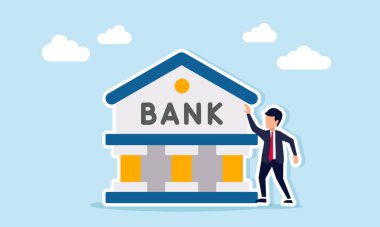 BANK sözcüğünün olduğu bir binanın yanında duran işadamı, mali istikrar, acil durum fonları ve iş yatırımlarının resmedilmesi