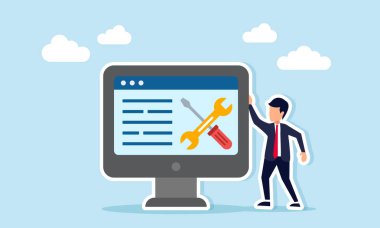 Bir tornavida ve anahtar gösteren bir monitörün yanında duran işadamı, rutin servis zamanlamasıyla ilgili çevrimiçi ve dijital alarmın gösterimi