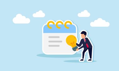 Bir kitap notunun yanında lamba taşıyan bir iş adamı, iş için doğru fikirleri yazmanın bir göstergesi.