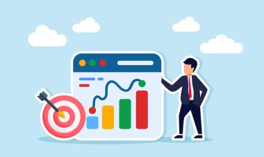 Hedef tahtası ve uygulama arayüzünün yanında duran işadamı, takım iş hedefleri performans değerlendirmesi ve analizini temsil eden bir grafik sunuyor