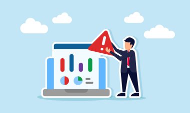 İş Adamı Uyarı İşletmesi İşletme ve Mali Performansta Uyarının Önemi Üzerine Grafik Gösteren Dizüstü Bilgisayarın yanında