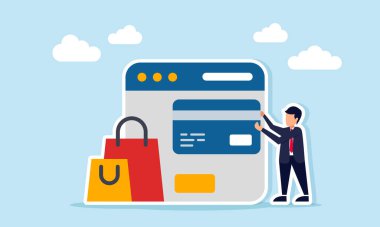 Çevrimiçi ve dijital ödeme sisteminin resimlerini uygulama arayüzü ve alışveriş çantalarının yanında tutan işadamı veya banka kartı