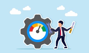 Seviye göstergesine sahip dişli makinesinin yanındaki işadamı tornavida tutuyor ve iş sistemleri için rutin bakım örneklerini gösteriyor.