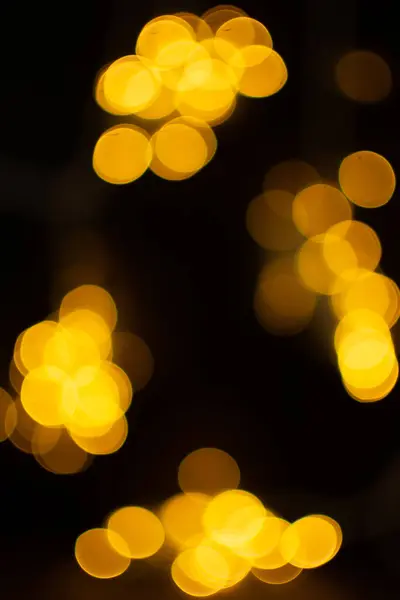 Efeito Bokeh Luzes Douradas Fundo Preto Estrelas Cintilantes Abstrato Brilhante — Fotografia de Stock